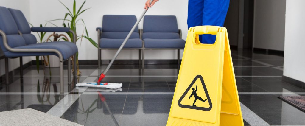 Patriot USA crew machine-scrubbing a commercial floor